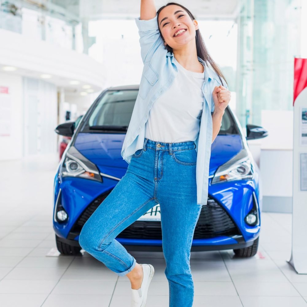 happy-woman-car-dealership happy-woman-car-dealership